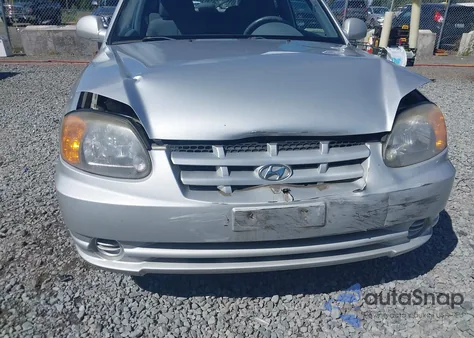 2004 Hyundai Accent Gl/Gt z USA, uszkodzony, nr VIN KMHCG35C84U291905